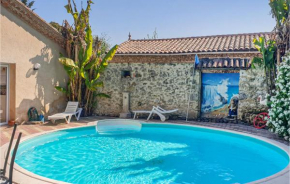 Nice home in Gondrin with Outdoor swimming pool, WiFi and 3 Bedrooms